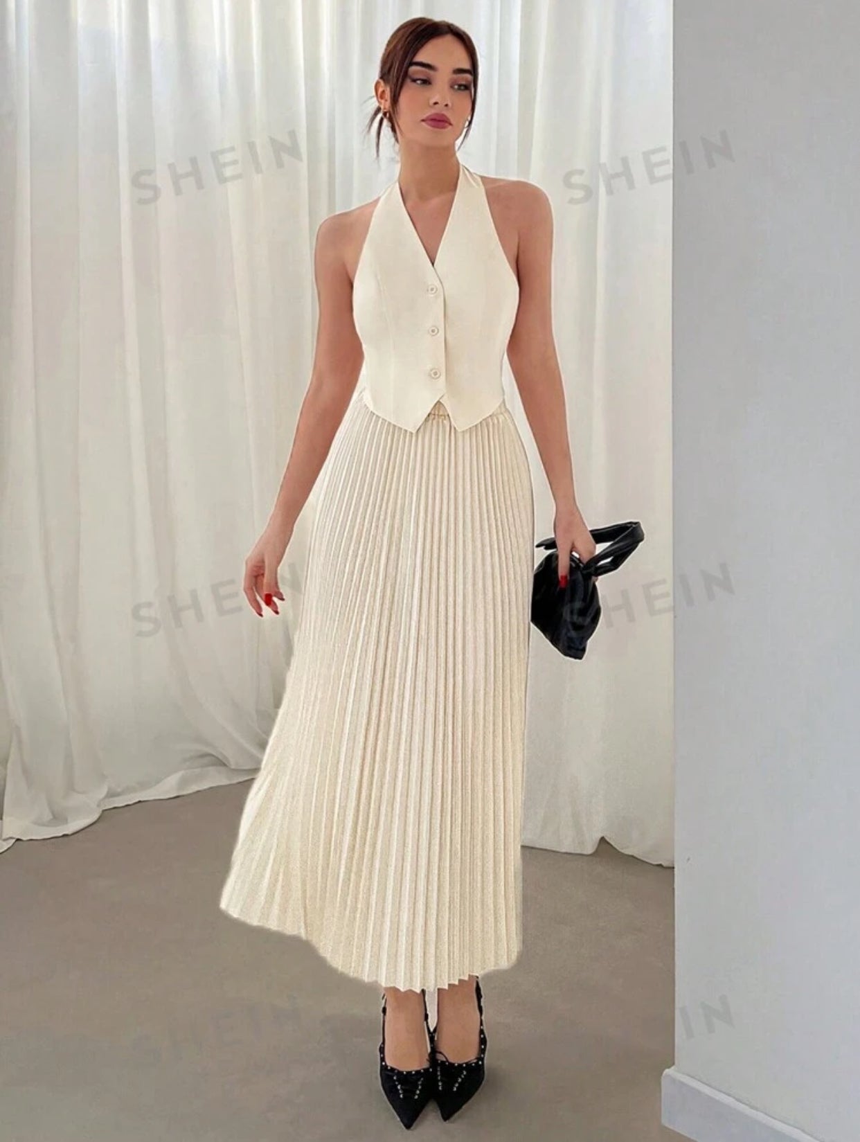 Conjunto de Falda plisada con chaleco