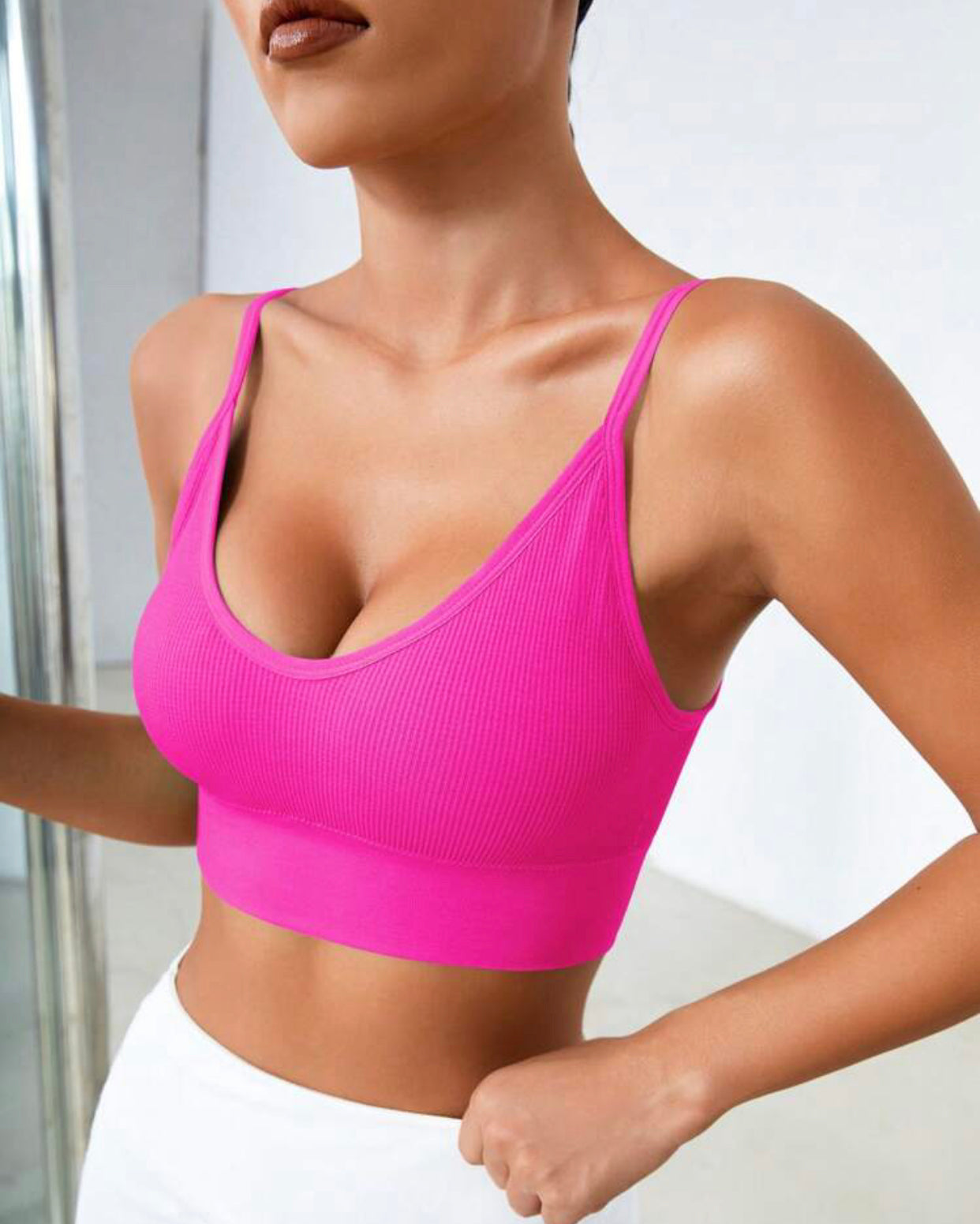 Top deportivo fucsia